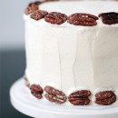 Banana Cake with Praline Filling and White Chocolate Ganache