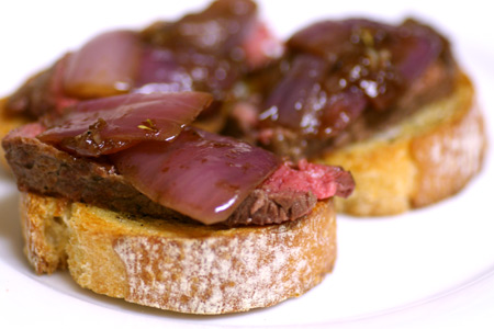 Bistecca with Balsamic-Roasted Onion Crostini