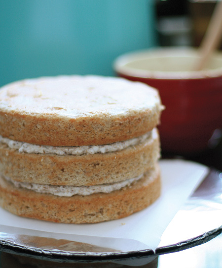 Banana Cake with Praline Filling and White Chocolate Ganache