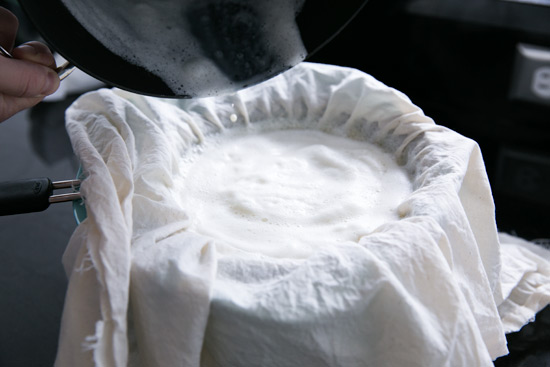 Straining the Soymilk Making Homemade Tofu