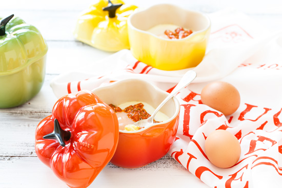 Baked Eggs with Polenta and Red Pepper Pesto from @loveandoliveoil