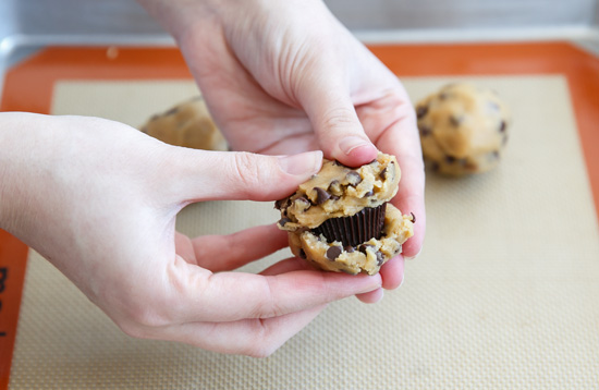 Stuffed Peanut Butter Cup Chocolate Chip Cookies from @loveandoliveoil