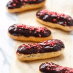 Chocolate Covered Strawberry Eclairs with strawberry cream filling and chocolate glaze
