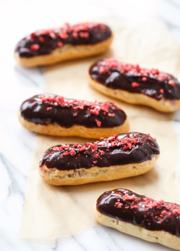 Chocolate Covered Strawberry Eclairs with strawberry cream filling and chocolate glaze