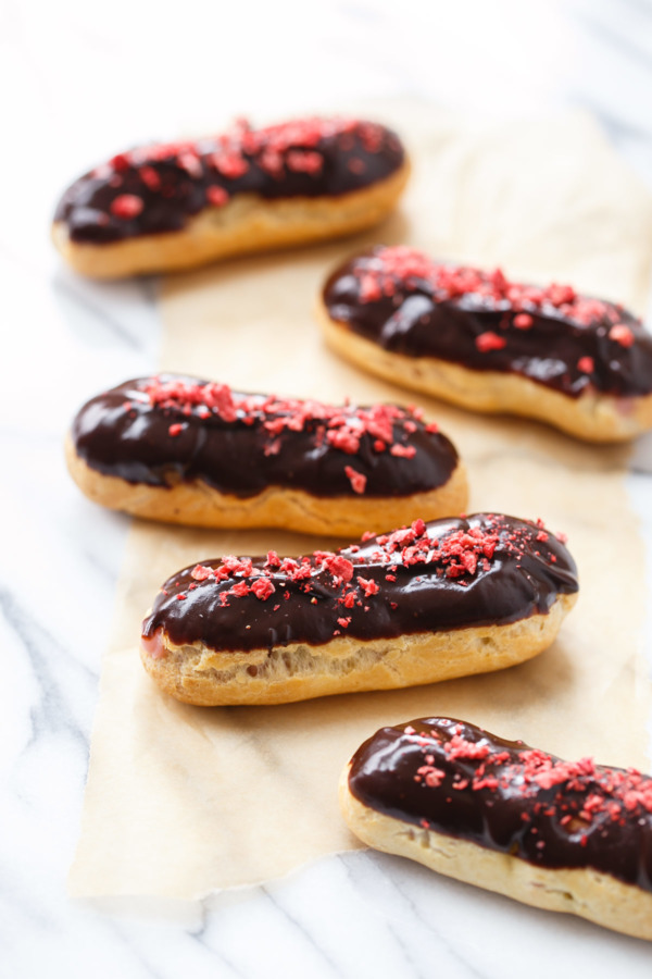 Chocolate Covered Strawberry Eclairs with strawberry cream filling and chocolate glaze
