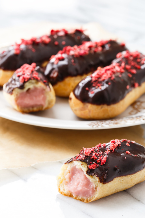 Chocolate Covered Strawberry Eclairs Recipe with a creamy strawberry custard filling