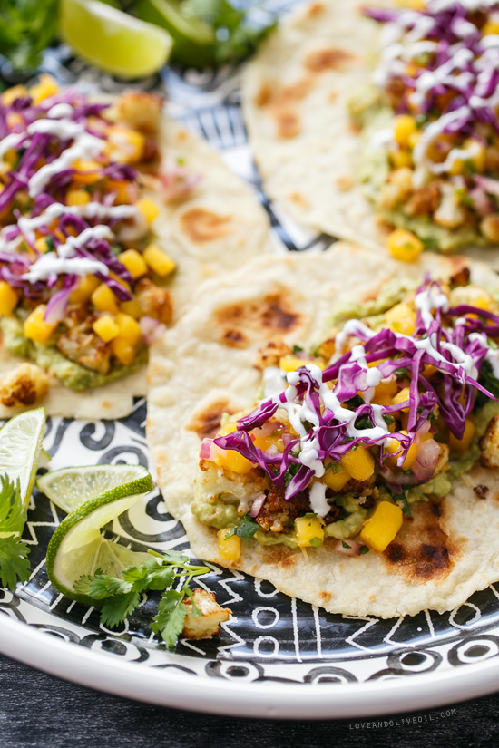 Crispy Cauliflower Tacos with Mango Salsa from www.loveandoliveoil.com