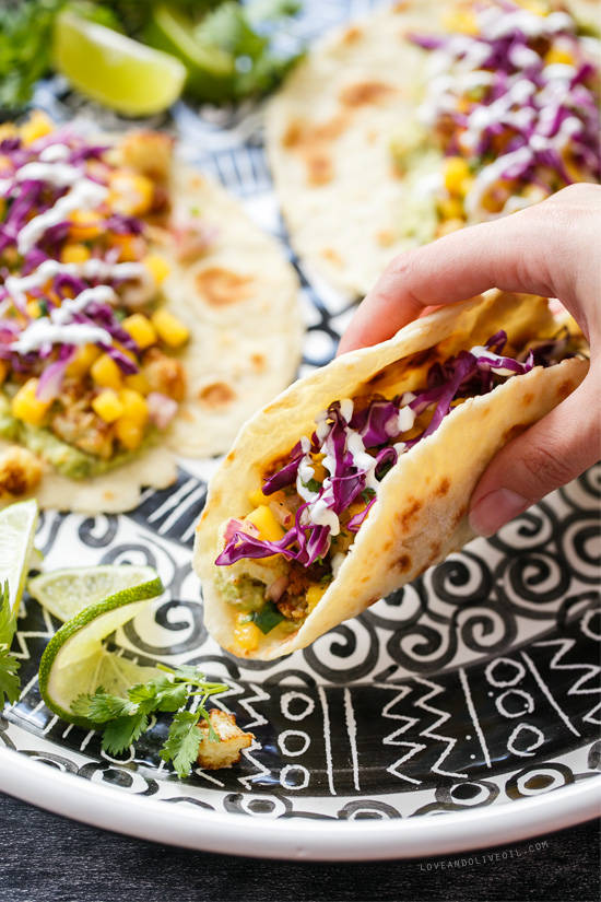 Crispy Cauliflower Tacos with Mango Salsa from www.loveandoliveoil.com