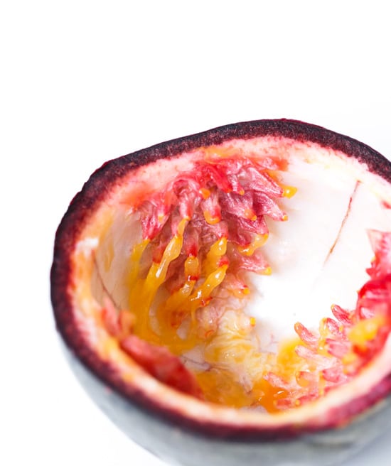 The inside of a passion fruit