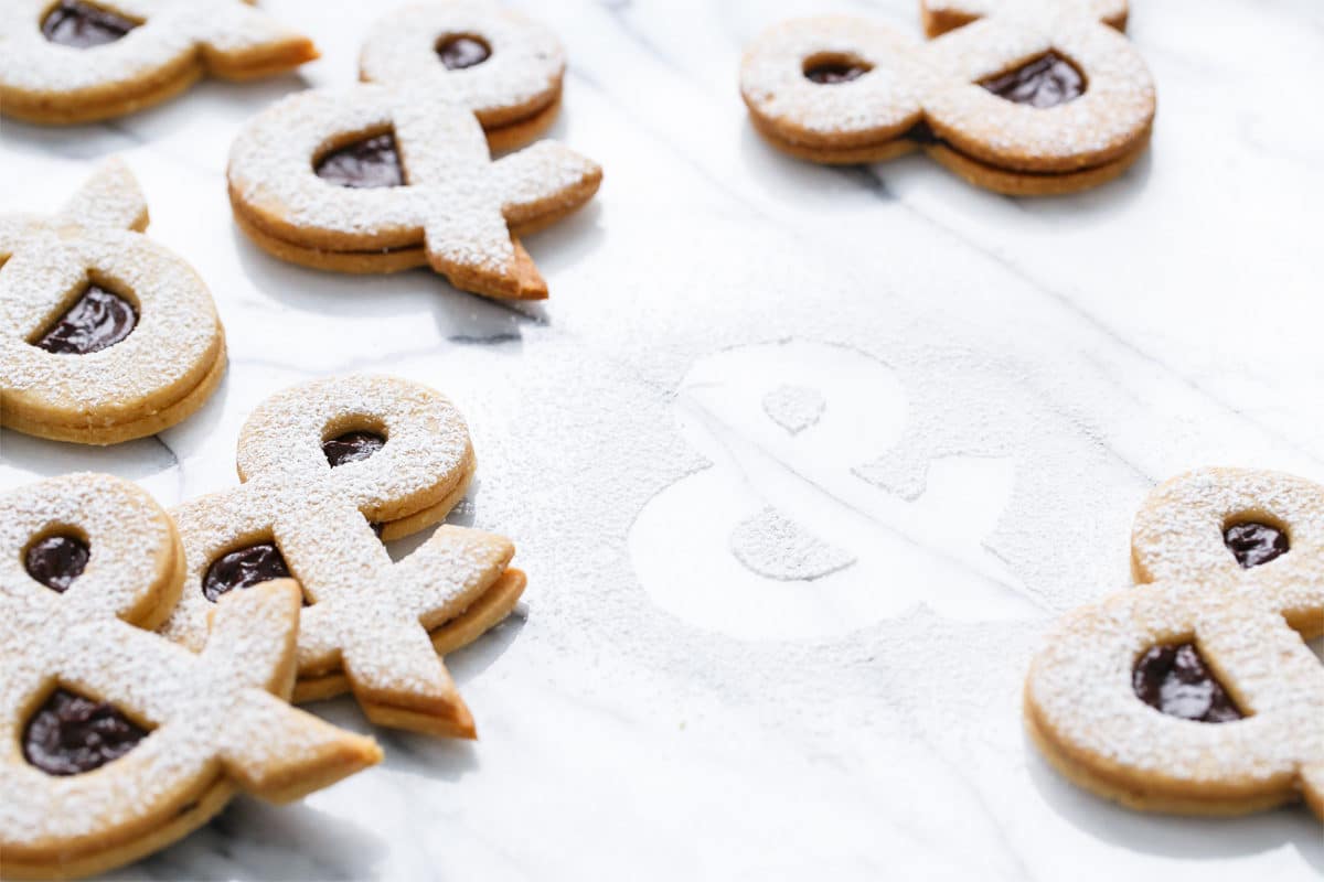 Ampersandwich Cookies (Peanut Linzer Cookies with Strawberry Chocolate Ganache)