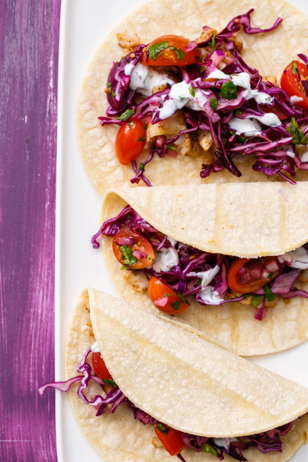 Mahi Mahi Fish Tacos with Tangy Red Cabbage "Slawsa" and Cilantro-Lime Sour Cream