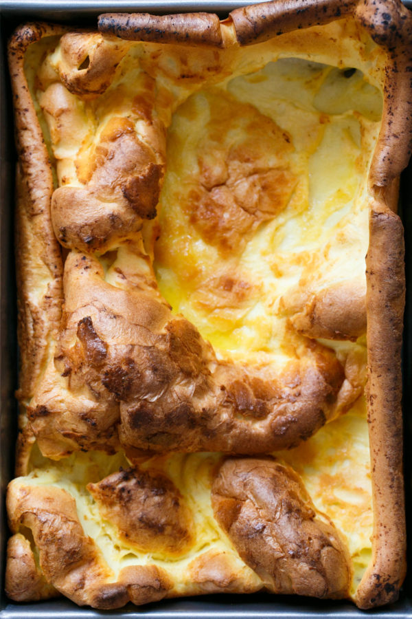 Classic German Pancakes with Maple Syrup and Powdered Sugar, made in a 13x9-inch pan to share.