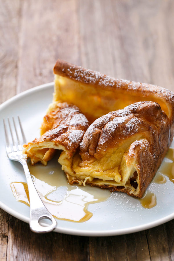 Classic German Pancakes with Maple Syrup and Powdered Sugar