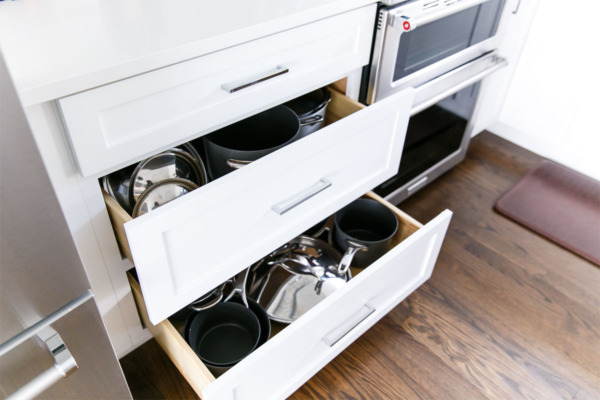 Townhouse Kitchen Remodel: Large cabinet drawers for pots and pans.