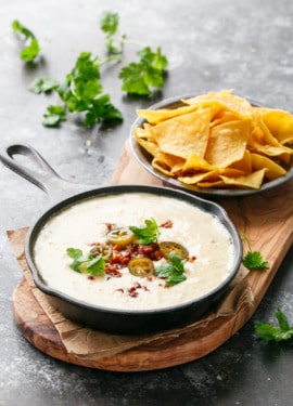 Spicy White Queso with Chorizo and Pickled Jalapenos