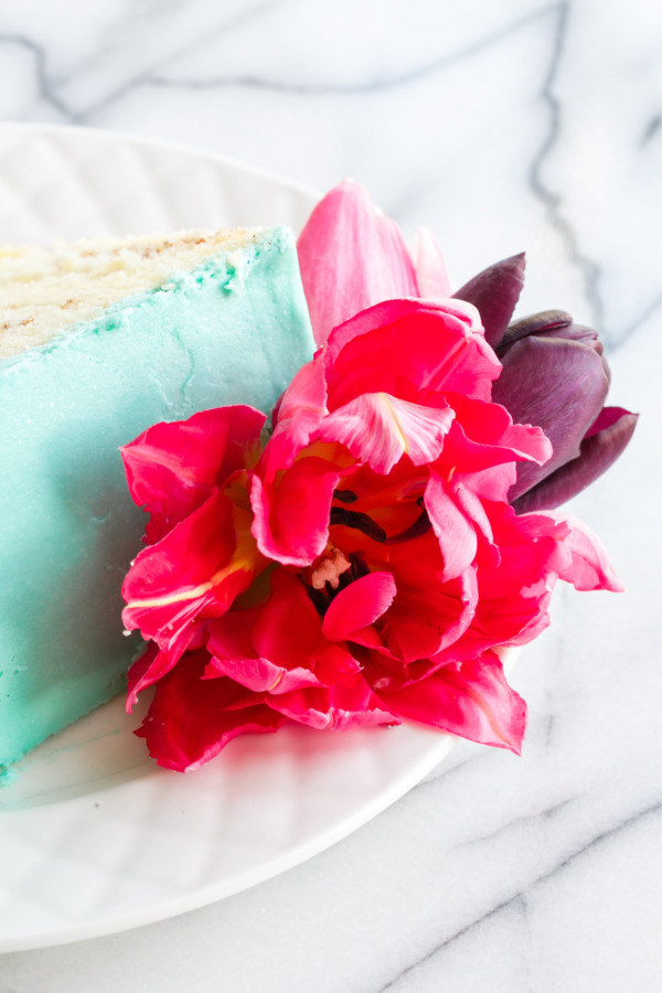 Cinnamon Swirl Layer Cake decorated with fresh flowers