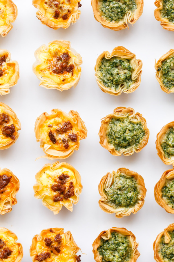 Mini Quiches made a perfect party appetizer, filled with any manner of add-ins including pesto or chorizo.