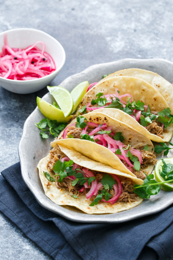 Slow-Cooker Pulled Pork Taco Recipe with Quick Pickled Onions on Top