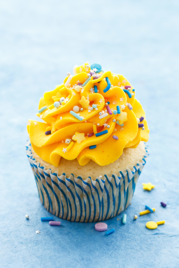 Light and Fluffy Banana Cupcakes with Banana Mousse Filling and Vanilla Buttercream