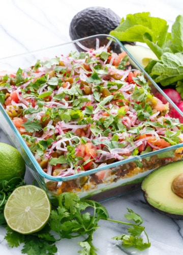 Mexican 7-Layer Dip with pickled jalapenos and cilantro lime guacamole