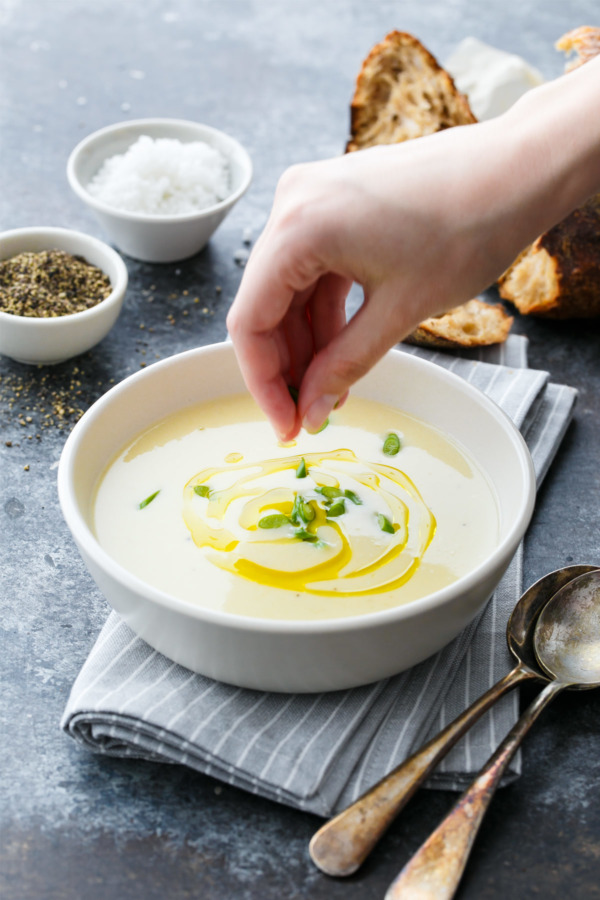 Green Garlic Soup topped with garlic scapes and watercress