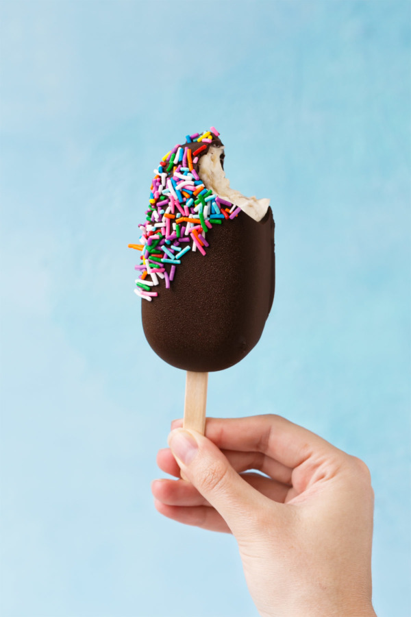 Frozen Banana Ice Cream Bars, coated in chocolate and dipped in rainbow sprinkles