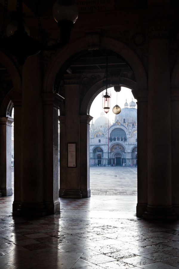 St. Mark's Basilica in Venice, Italy is completely empty at sunrise.