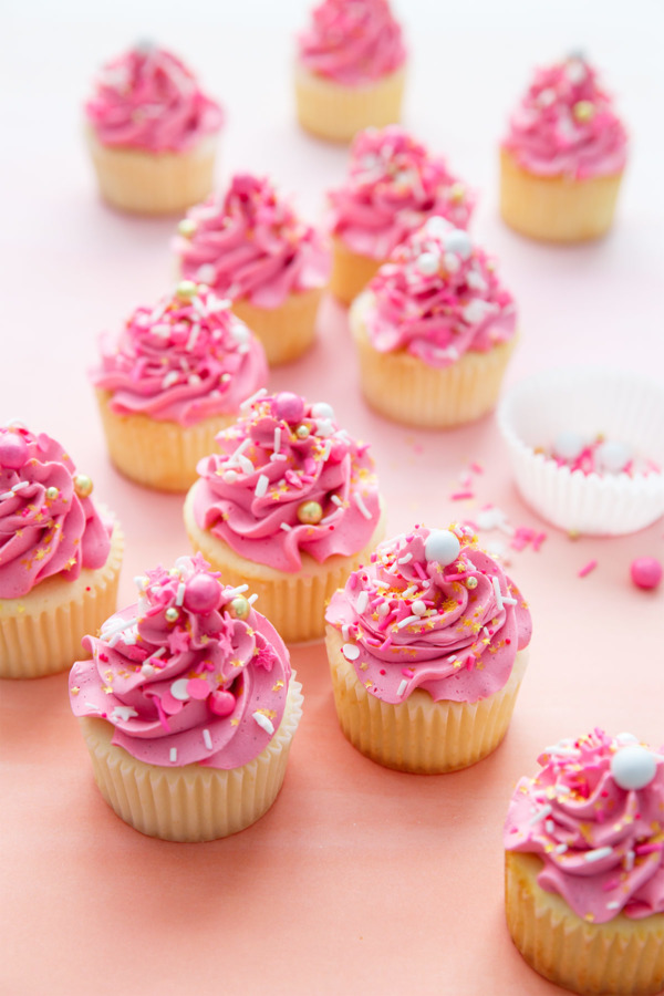 Fluffy White Wedding Cake Cupcakes with Marshmallow Buttercream and a surprise inside!