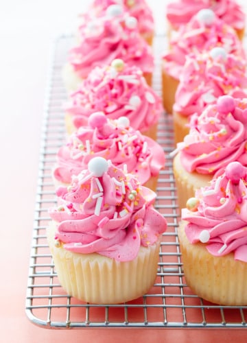 Sprinkle Filled Vanilla Cupcakes with the BEST EVER Marshmallow Buttercream