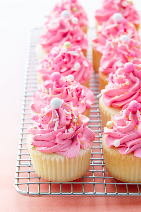 Sprinkle Filled Vanilla Cupcakes with the BEST EVER Marshmallow Buttercream