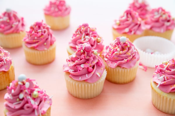 Sprinkle-Filled Fluffy White Cupcakes with Marshmallow Buttercream