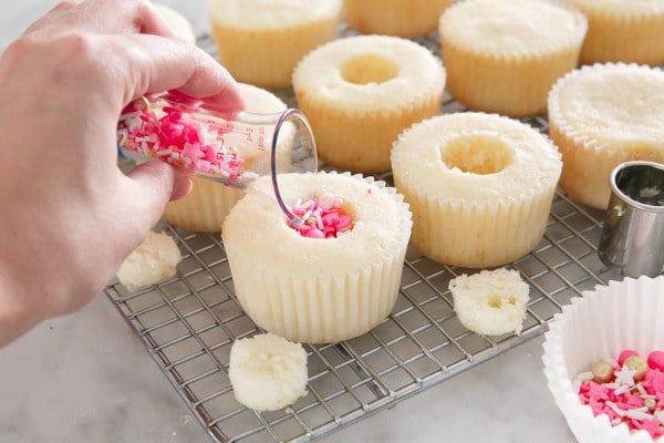 How to make Piñata Surprise cupcakes with sprinkles hidden inside!