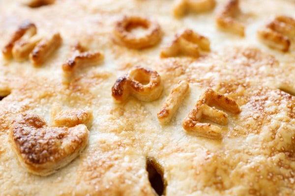 Marzipan Apple Pie with cut-out letters on the crust (cute pie decorating idea!)