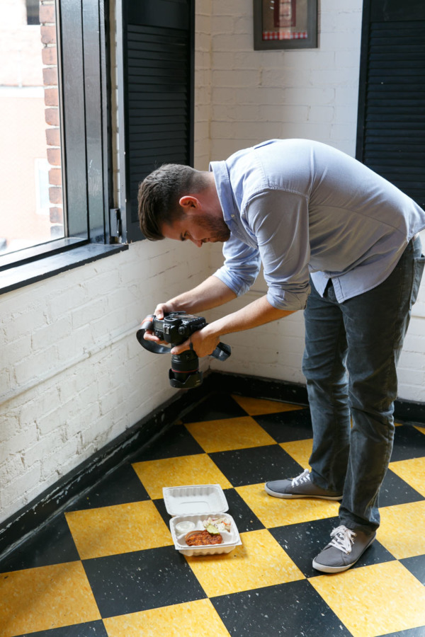 Phillip photographing his hot chicken at North Market's Hot Chicken Takeover, Columbus, Ohio