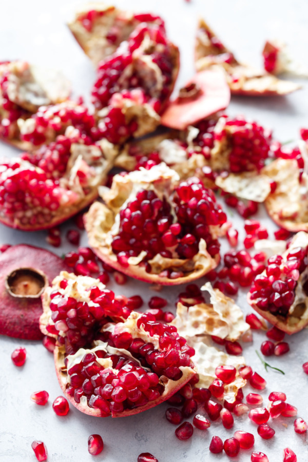 Fresh Pomegranate serves as the perfect final touch for this Black Sesame Hummus Recipe