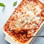 Your Favorite Chicken Parmesan, baked into a cheesy, flavorful pasta!