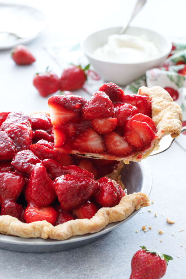 A perfect slice of Fresh Strawberry Rose Pie with ultra-flaky crust. Just add freshly whipped cream!