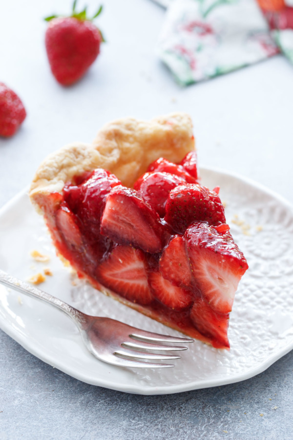 The perfect slice of strawberry pie, made with fresh strawberries and a hint of rosewater.