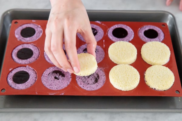 Adding the almond sponge cake to the mousse