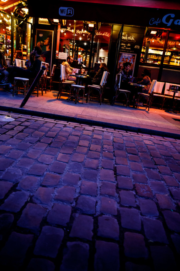 Walking the streets of Montparnasse at night, Paris, France