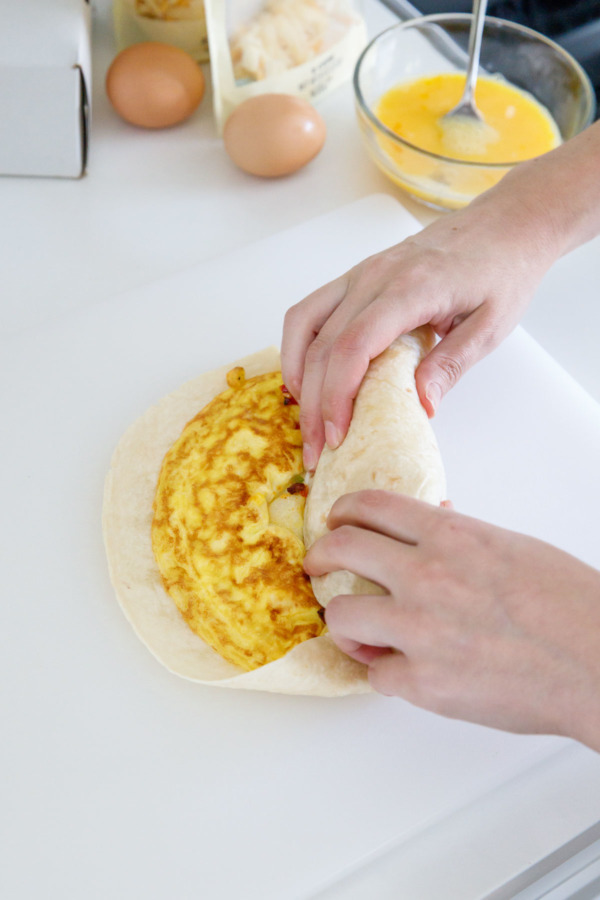 How to make the best breakfast burritos - roll it up in a nice neat package.