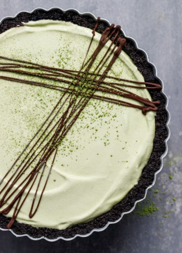 Matcha Mint Ice Cream Pie with Chocolate Cookie Crust and a layer of hot fudge sauce