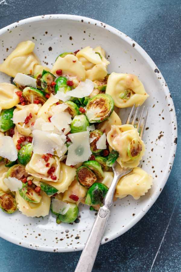 Parmesan & Brussels Sprout Tortelloni Recipe with Crispy Pancetta and Parmesan Cream Sauce