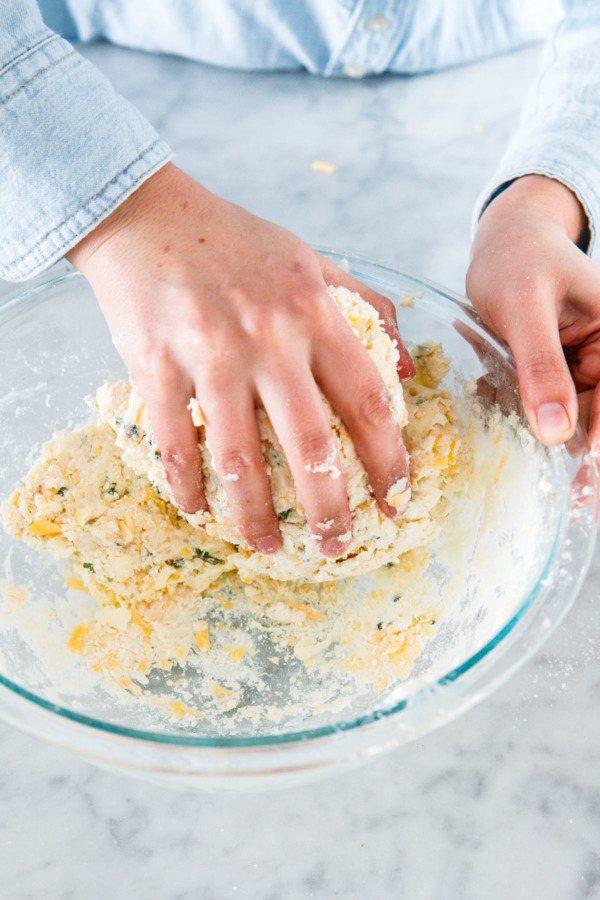 How to make buttermilk biscuits from scratch: knead dough once or twice until it forms a loose ball.