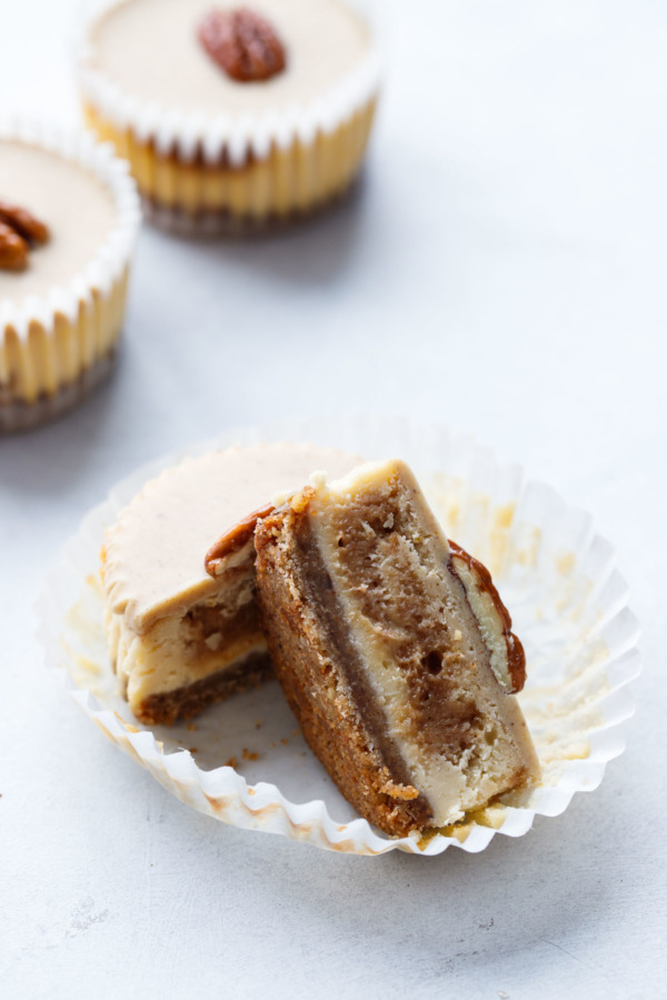 Mini Pecan Praline Cheesecake with pecan crust and pecan praline swirl.