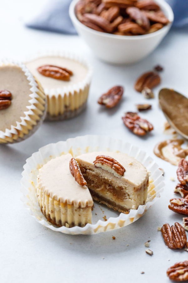 Mini Pecan Praline Cheesecakes with white chocolate gianduja topping