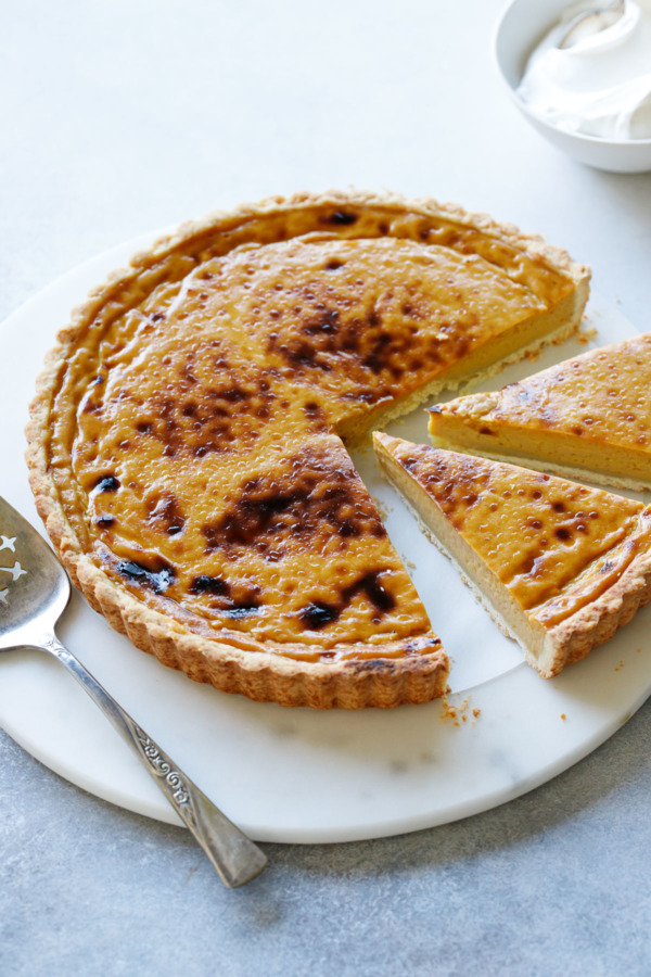 Pumpkin Custard Tart, broiled at the very end until speckled brown on top.