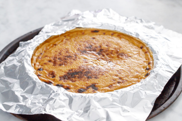 Make a foil shield so the crust doesn't burn when broiling.