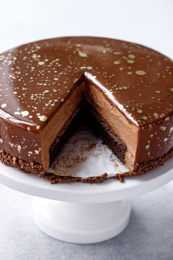 The chocolate mirror glaze makes this mousse cake extra impressive, a perfect holiday dessert recipe!