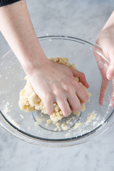 How to make Amaretti Morbidi cookies: knead to form a soft, sticky dough.